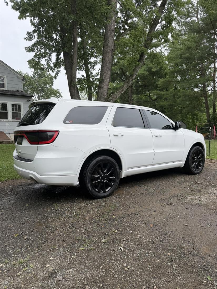 White Dodge Durango detailed at a customer's house